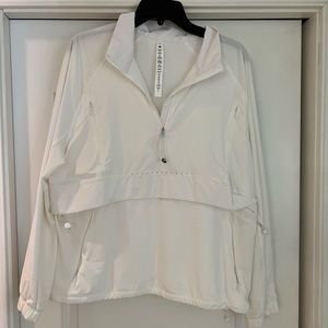 Iululemon size 8 ripstop running half zip.  Worn 1 time